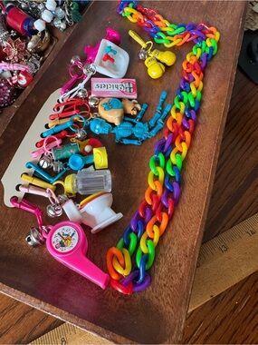 Vintage 1980's Plastic Clip On Bell Charm Necklace 13 Charms Skeleton Rainbow